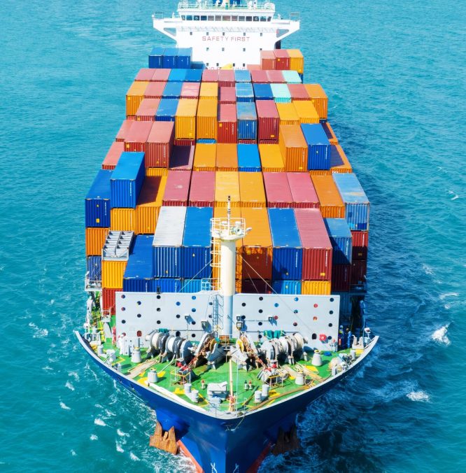 front view Cargo Container ship in the ocean ship carrying container and running for import export concept technology freight shipping by ship
